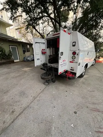Magnet Plumbing service vehicle on-site for Grease Trap Cleaning in Webatuck